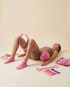 Woman using the Numan Pilates Essentials Kit